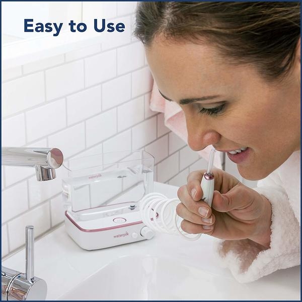 Dễ dàng vệ sinh răng miệng và đánh tan mảng bám men răng với máy tăm nước